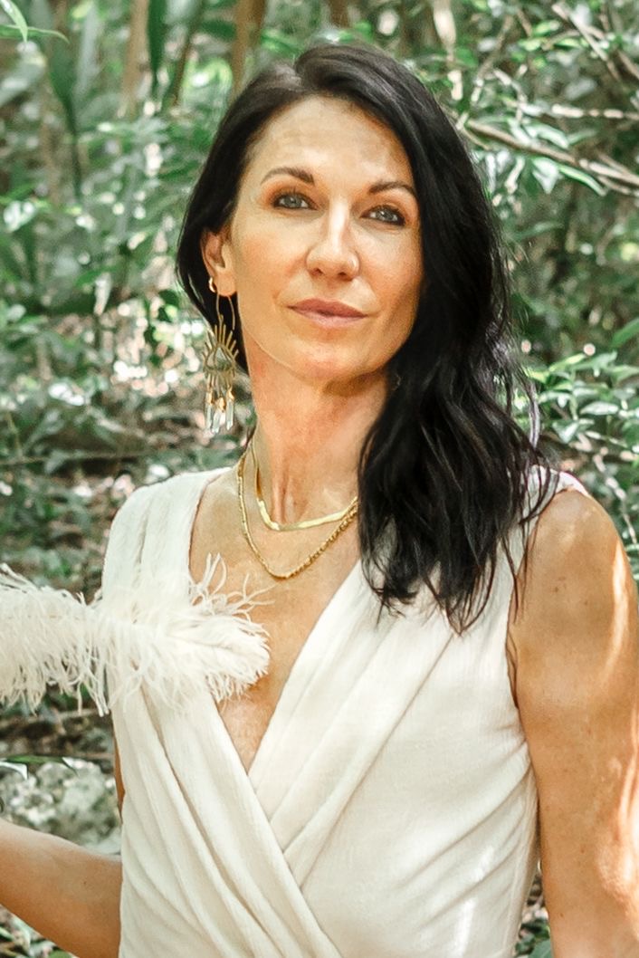 Bre Hamideh in cream silk against the Tulum jungle