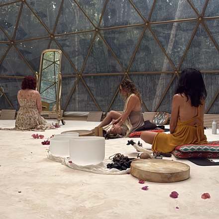 Quiet ceremony inside the gold dome, crystal bowls and rose petals